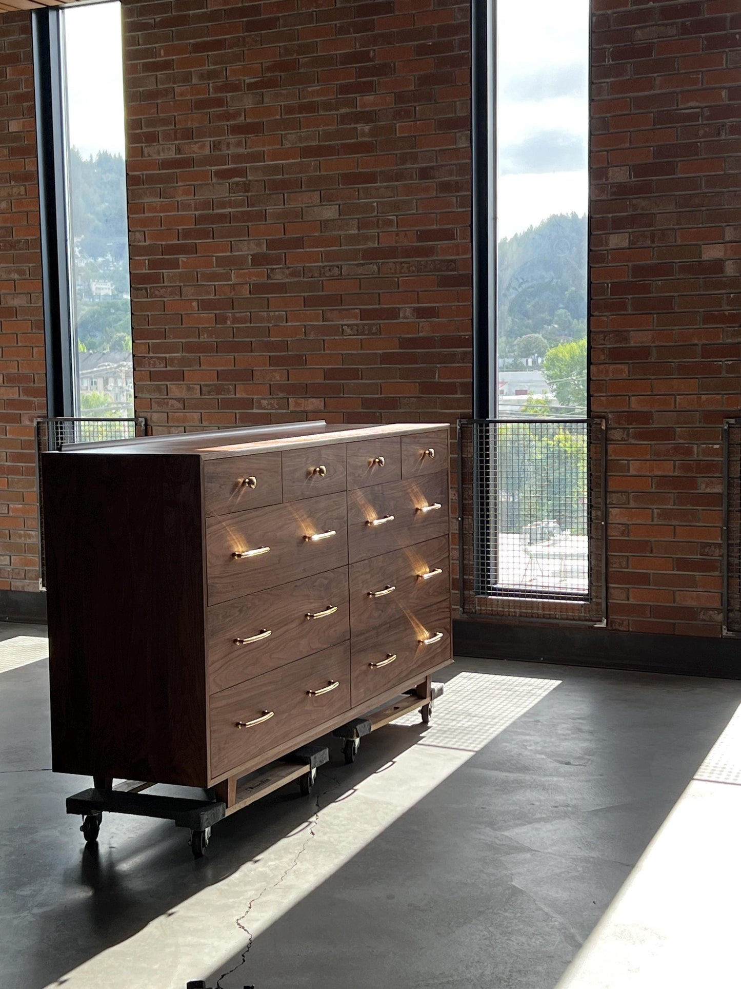 The “Levine Dresser”, Mid Century Modern Hardwood Dresser with a Gallery Rail & Hand Cut Joinery. Fully Customizable Sizing and Drawers.