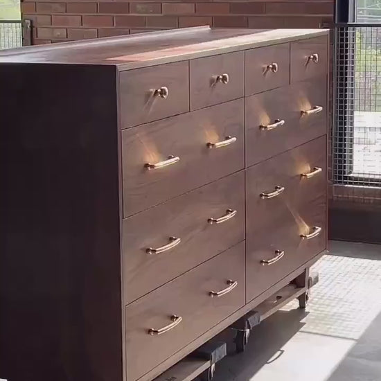 The “Levine Dresser”, Mid Century Modern Hardwood Dresser with a Gallery Rail & Hand Cut Joinery. Fully Customizable Sizing and Drawers.